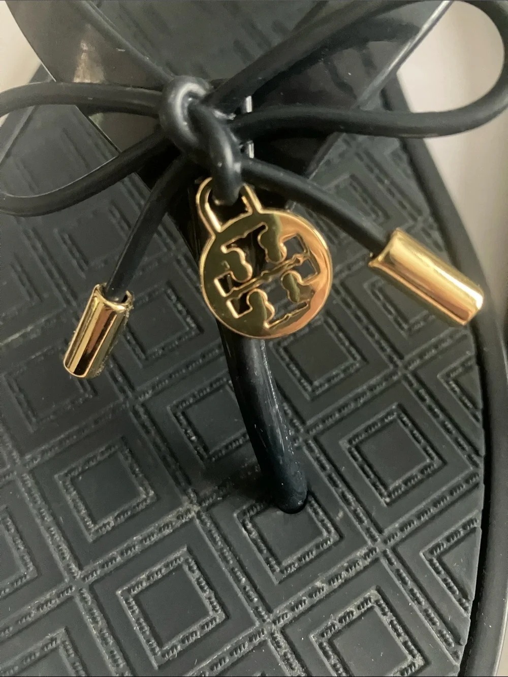 Tory Burch Black Jelly Bow Logo Flip Flops with Gold Accents